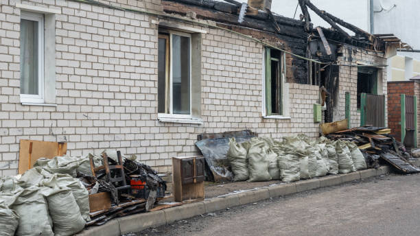 Professional Fire Damage Removal technician working in Helmetta, NJ
